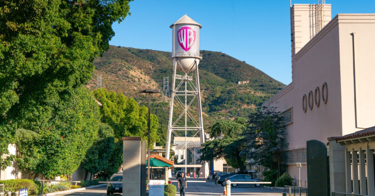 The Warner Bros. studio lot and iconic water tower with a pink logo to commemorate the "Barbie" movie