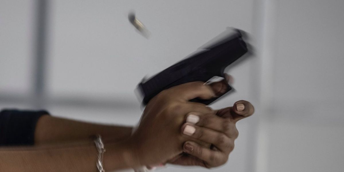 NextImg:Man apparently fueled by road rage follows woman into parking lot, tries to enter her vehicle — but she's carrying a gun and fatally shoots him