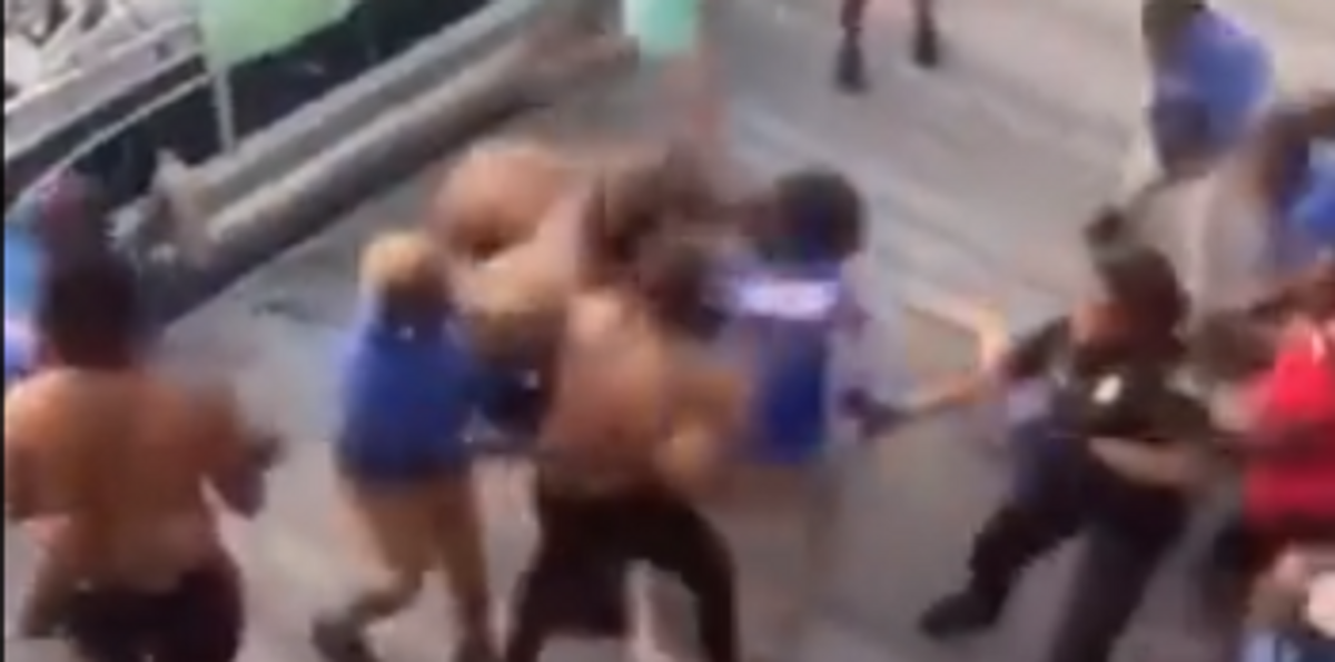 NextImg:Viral video shows rowdy brawl break out on Alabama dock, man hit over the head with chair, woman thrown into water