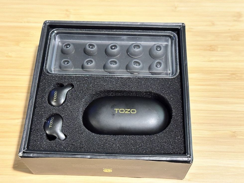 a photo of TOZO Golden X1 Wireless Earbuds unboxed