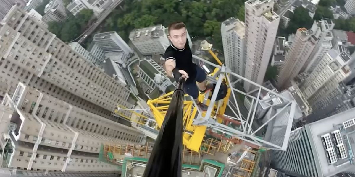 Daredevil climber who posted photos, videos of his high-altitude exploits is dead after falling over 700 feet from Hong Kong building