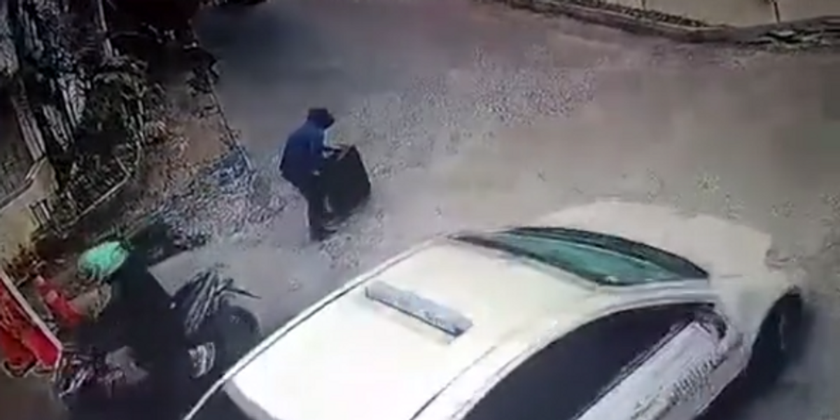 NextImg:Chilling security camera video shows Philippines man abducting 8-year-old girl in a suitcase
