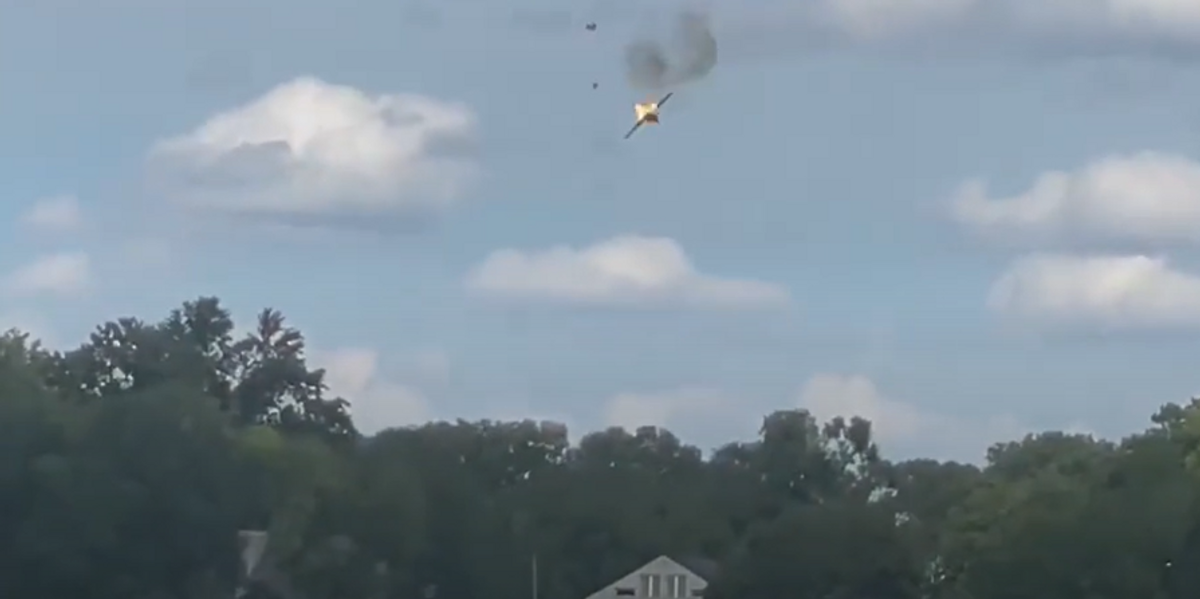 NextImg:Video: Fighter jet crashes near apartment building complex during air show in Michigan