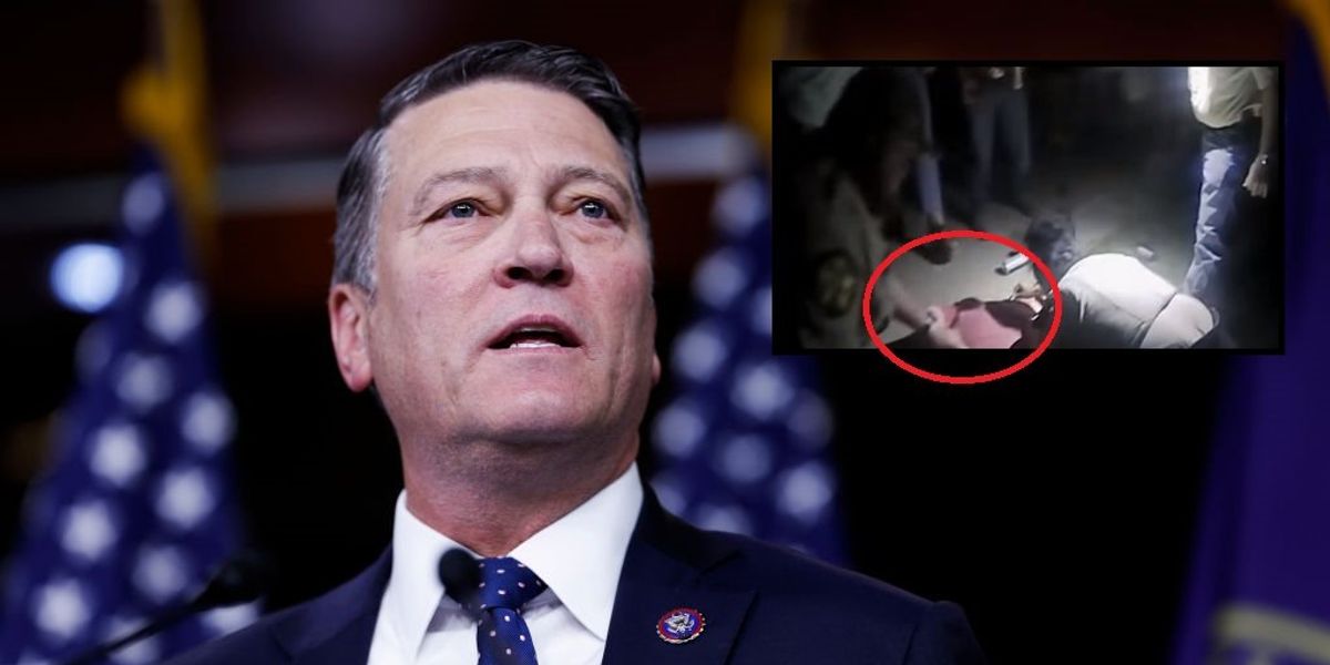 Bodycam video shows cops wrestle Rep. Ronny Jackson to ground, place him in handcuffs after he tries to aid teen in medical distress at rodeo: 'This is f***ing ridiculous'