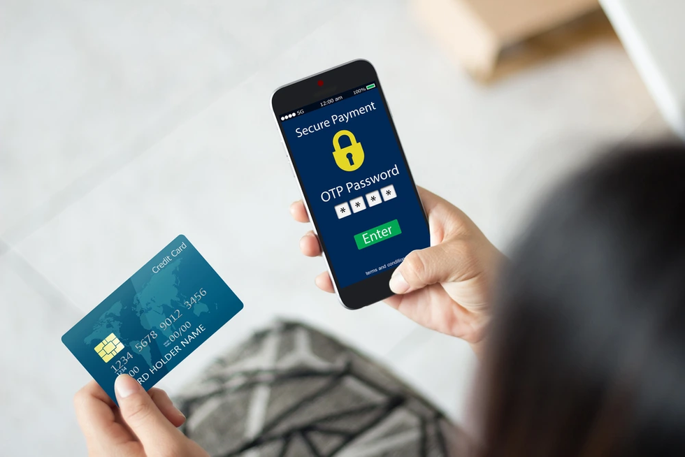 a photo of credit card and smartphone putting in secure payment
