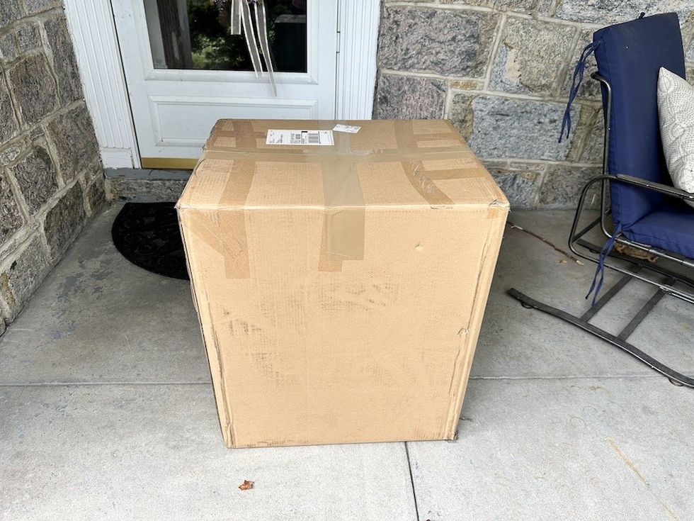 photo of the shipping box Loxx Boxx comes in on a porch