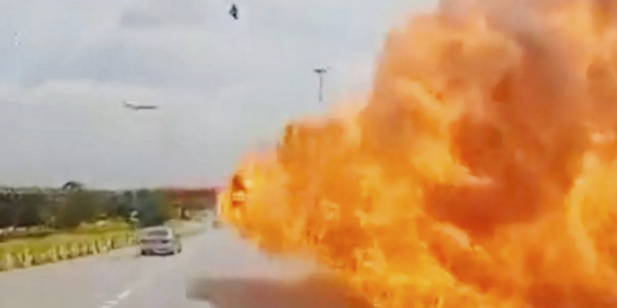 NextImg:Terrifying video shows jet plane crash into traffic on expressway in Malaysia