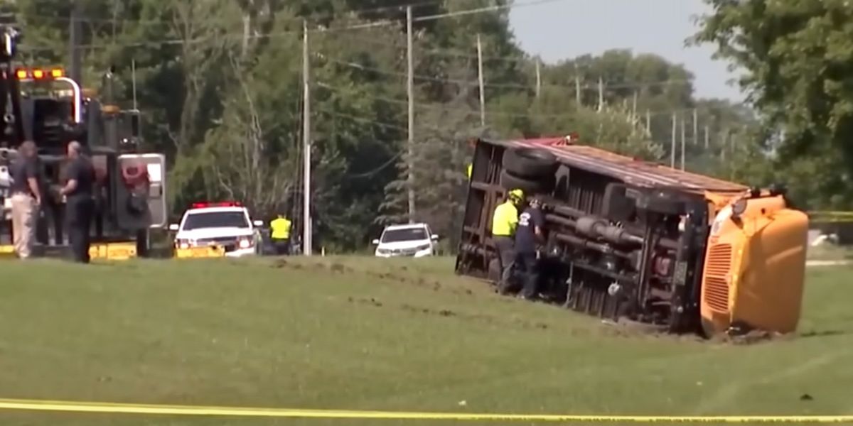 NextImg:1 child dead and 23 injured after minivan crashes into school bus on first day of school in Ohio