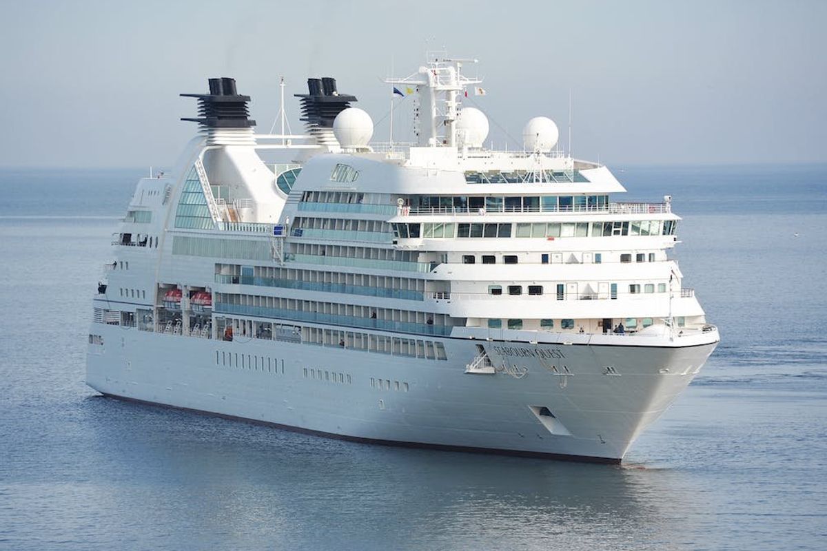 white cruise ship on the sea