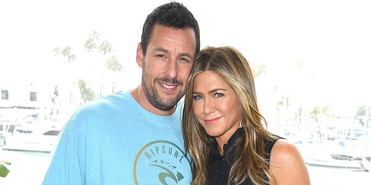 The Sweet Reason Adam Sandler Sends Jennifer Aniston Flowers Every