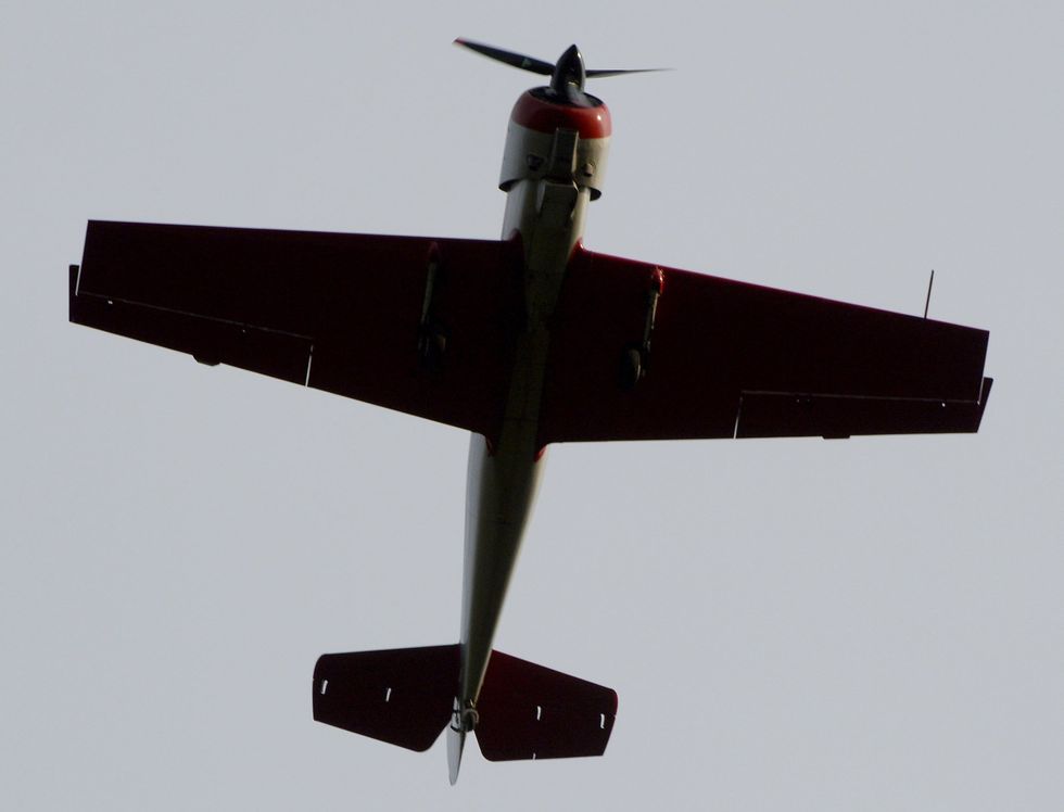 A close-up of a plane flying.