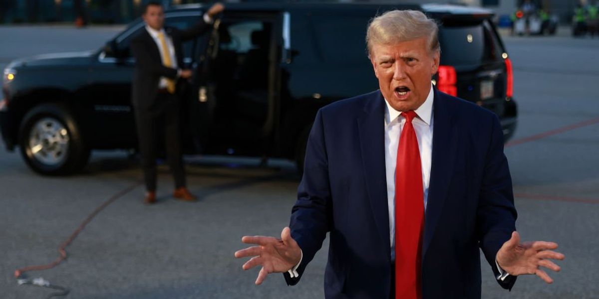 NextImg:See it: Trump mug shot released after he surrenders, gets booked at Georgia jail