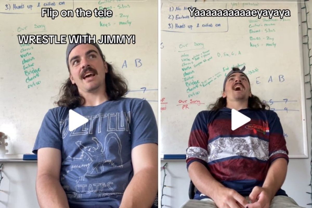 teacher sitting in front of a classroom