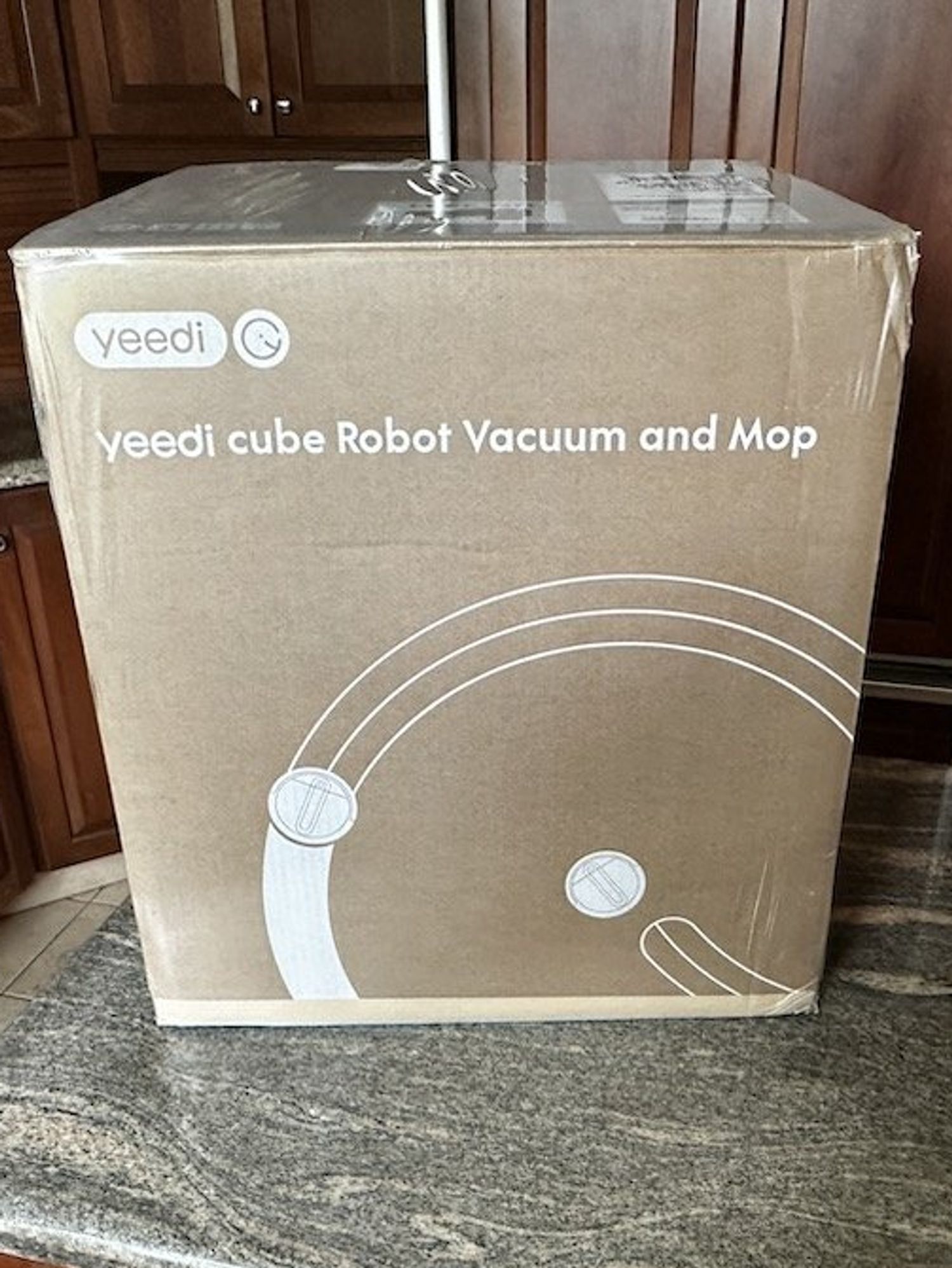 a photo of yeedi cube robot vacuum and mop box