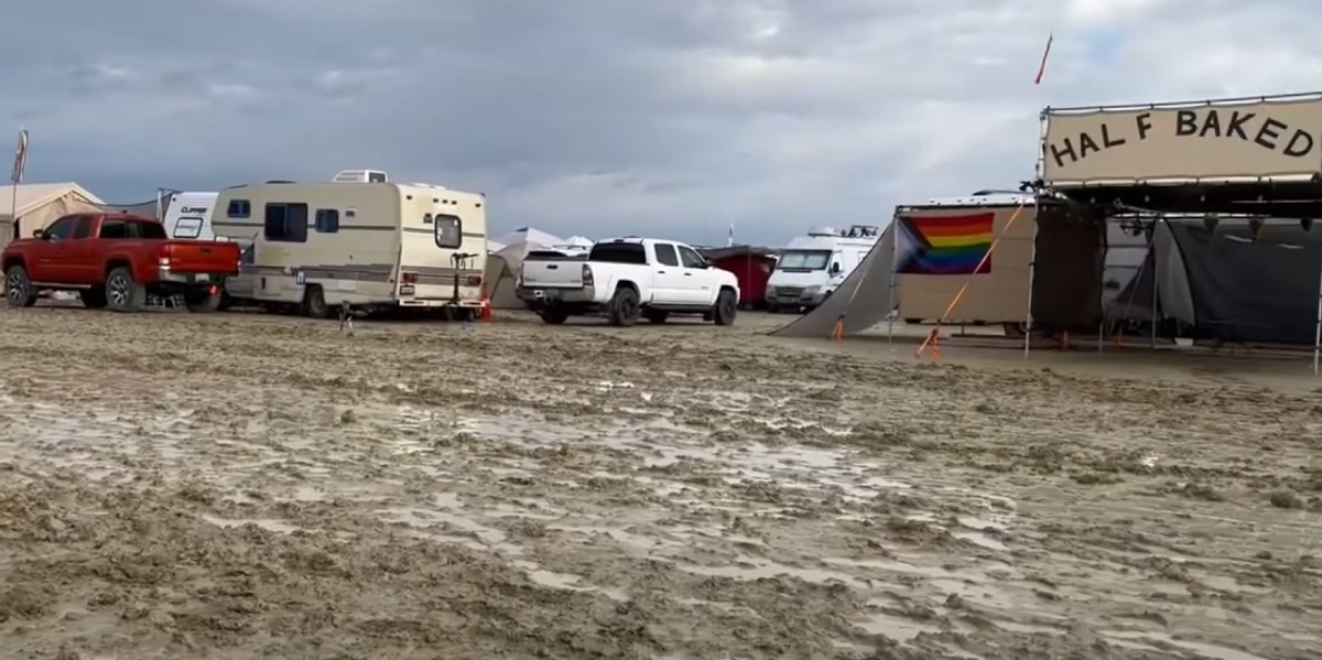 NextImg:Death investigation launched at Burning Man, flooding strands 70,000 at festival that Chris Rock escaped by hitchhiking