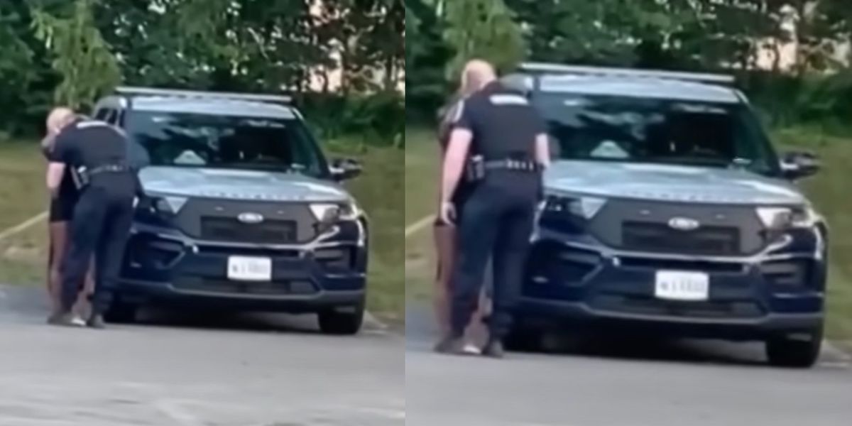 Cop suspended over viral video apparently showing him go into backseat of cruiser with woman, and his wife has responded
