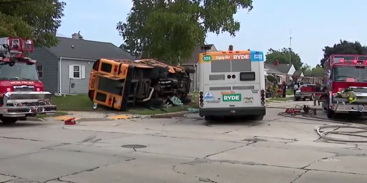 NextImg:Security camera shows school bus blow through stop sign and get hit by city bus, 6 people hurt