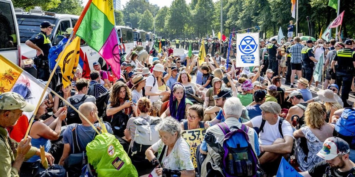 NextImg:Thousands of climate protesters block highway in the Netherlands over government oil and gas subsidies