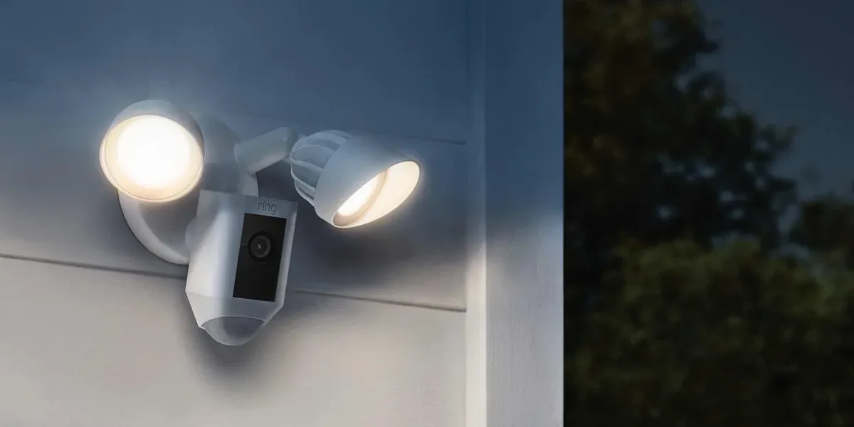 a photo of Ring Floodlight Cam Wired Plus installed on the side of the home