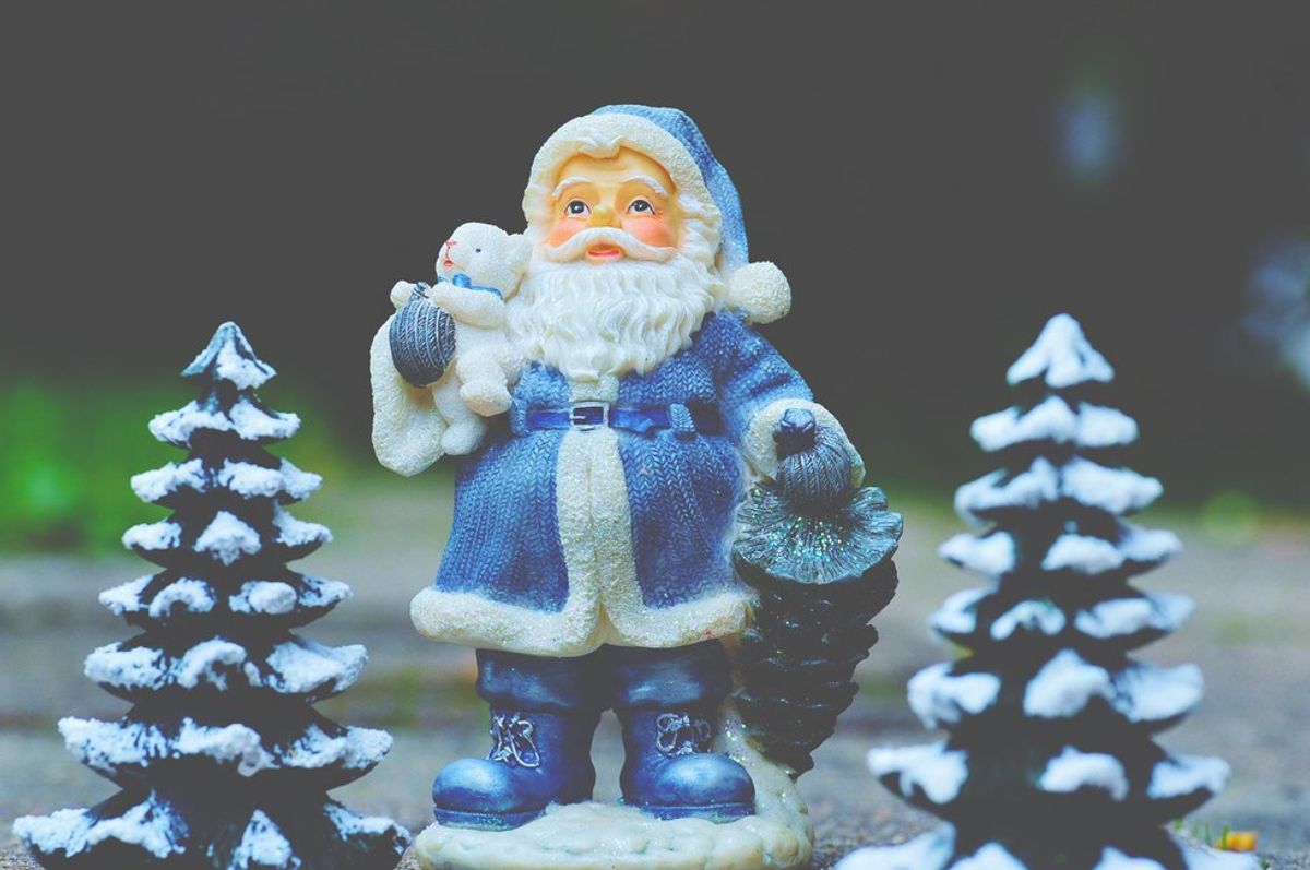 15 Uplifting Christmas Songs For When You're Feeling Down