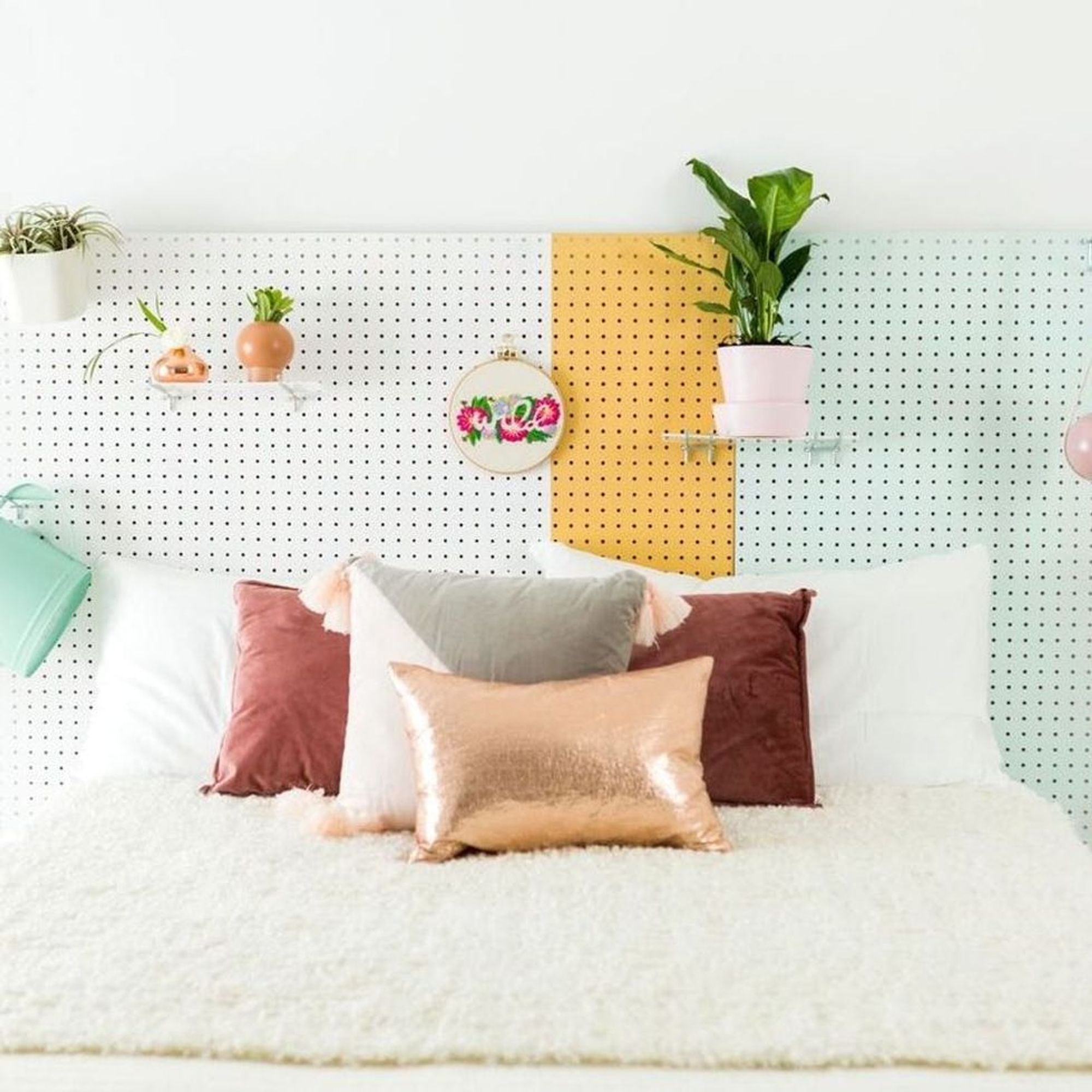 This Pegboard Headboard DIY Will Tie Your Entire Room Together Brit + Co