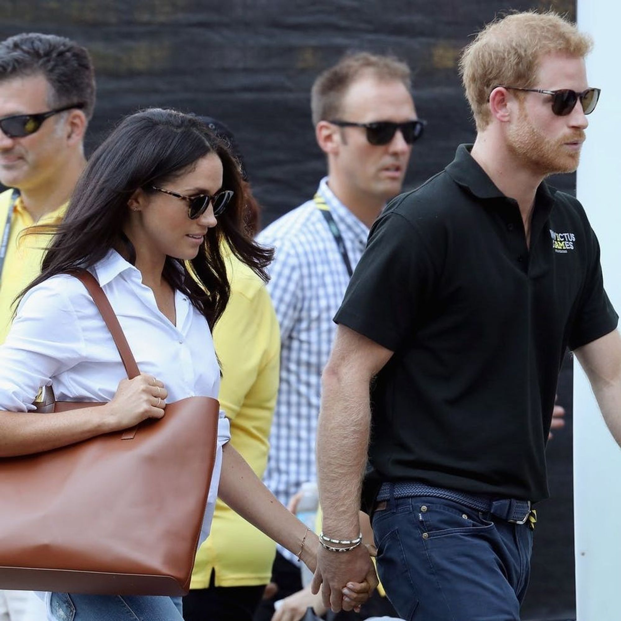 Meghan Markle Wears “Husband” Shirt for First Public Outing With Prince