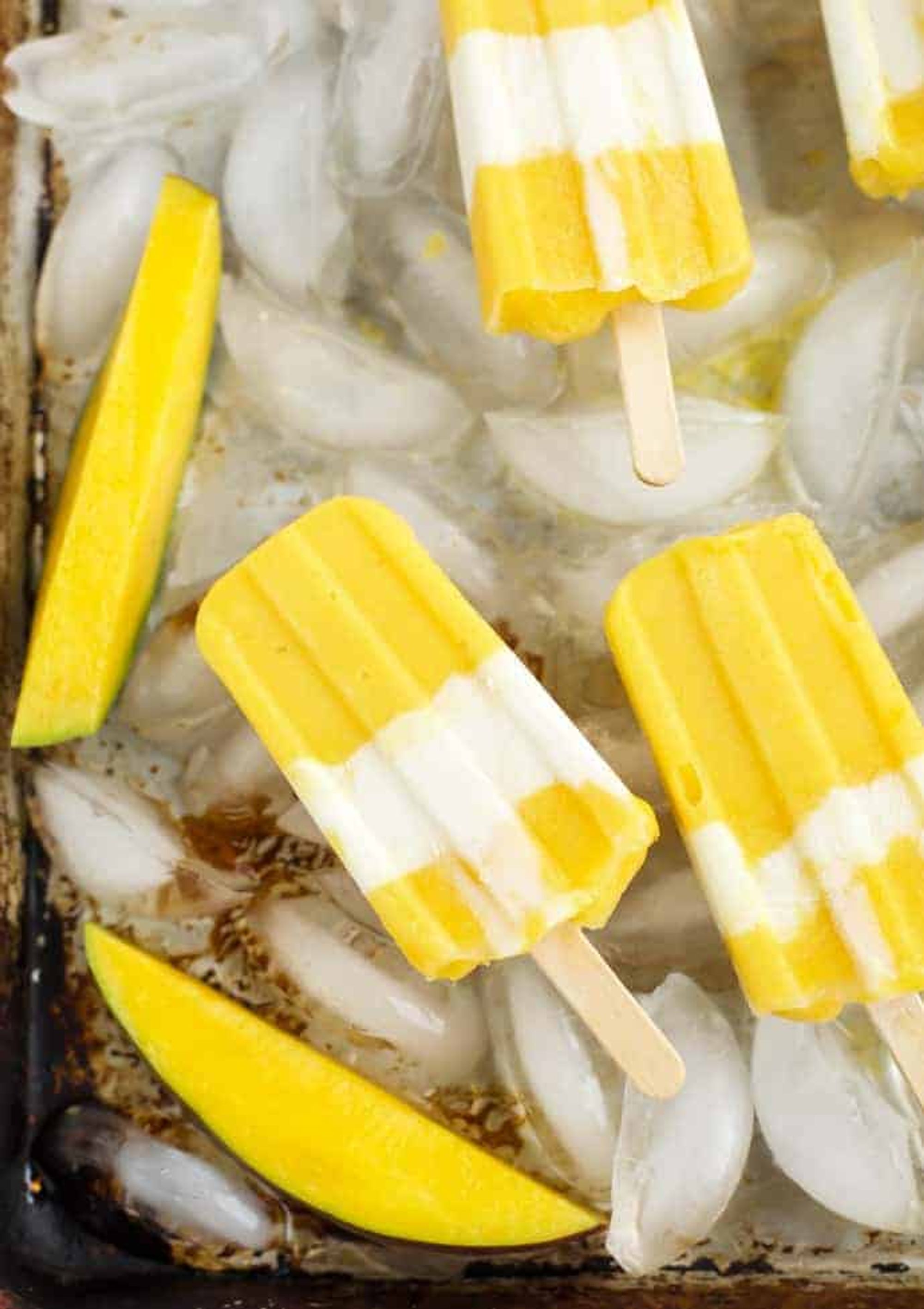Creamy Mango Popsicles · Seasonal Cravings My Recipe Magic