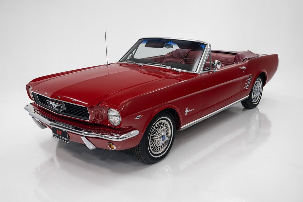 1966 Ford Mustang Convertible, red, front quarter, top down