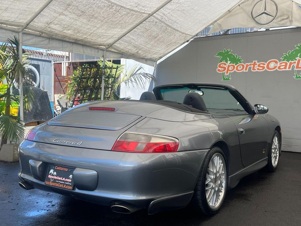 2002 Porsche Carrera 4 convertible - RH 3/4 rear, top down
