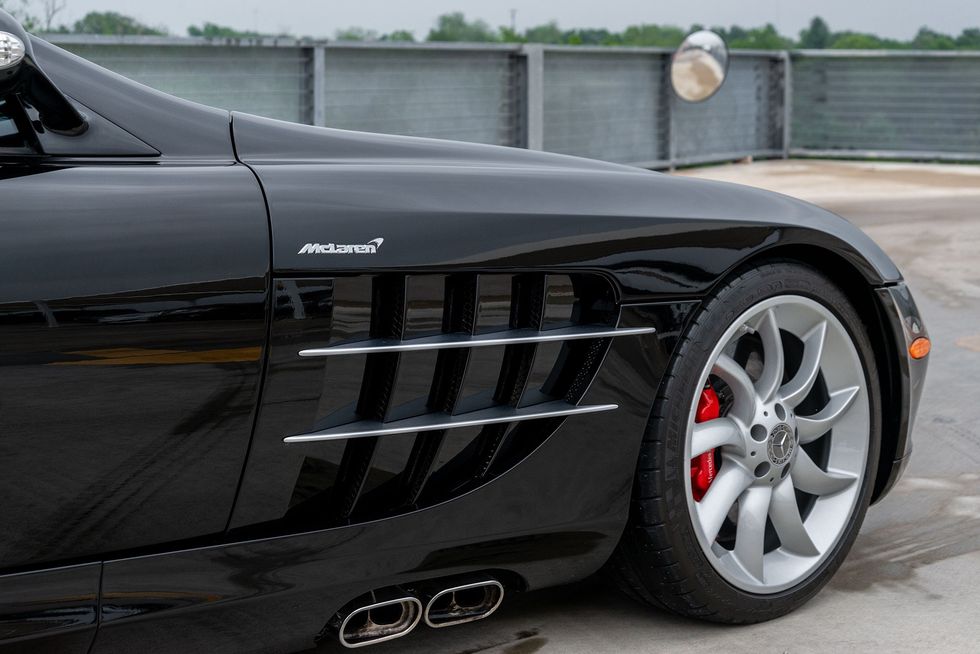 2006 Mercedes-Benz SLR McLaren, front fender detail showing fender vents and exhaust