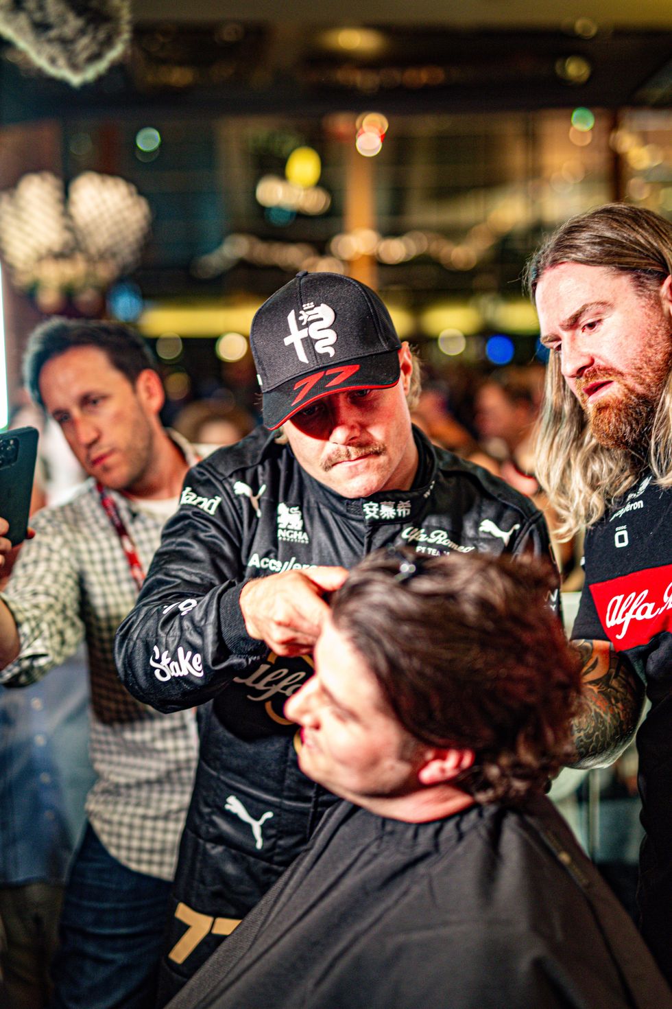 2023 Alfa Romeo F1 Livery - Matthew Collins shaving a fan's head