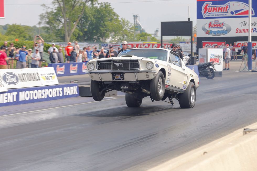 25th Annv. Ford Homecoming - Rusty Hall driving Richie Pauley's CJ Mustang