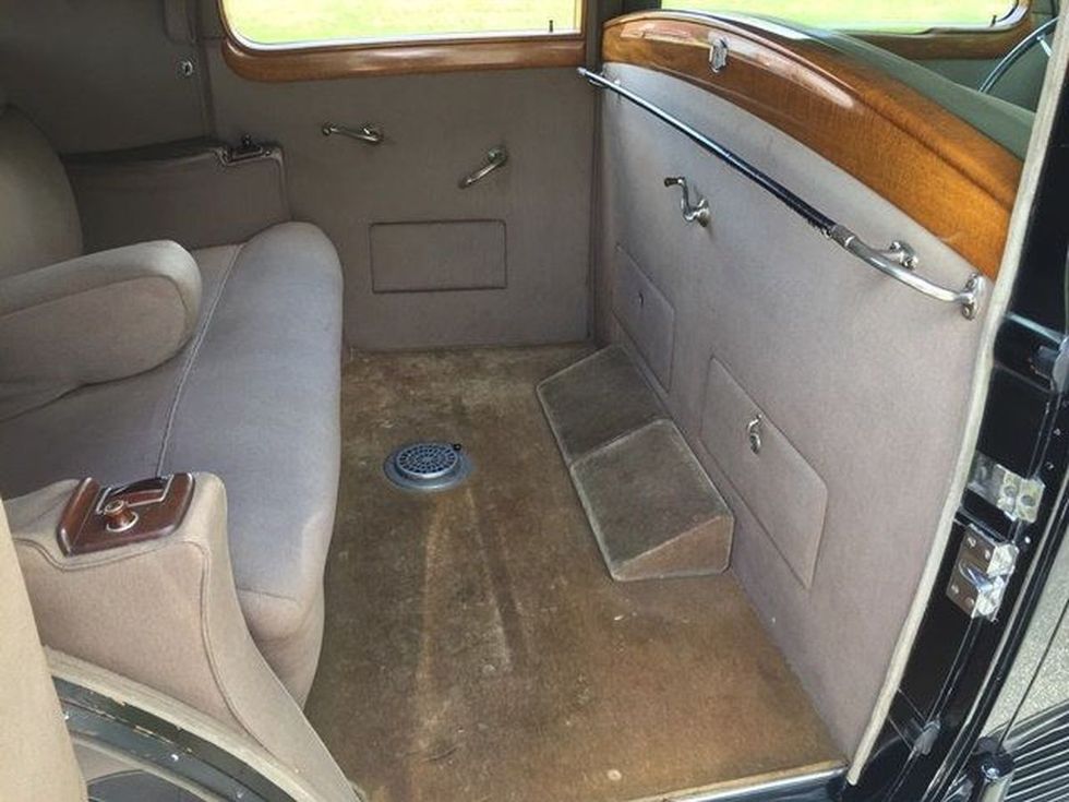 black 1940 Lincoln Model K two window berline Judkins rear seat compartment