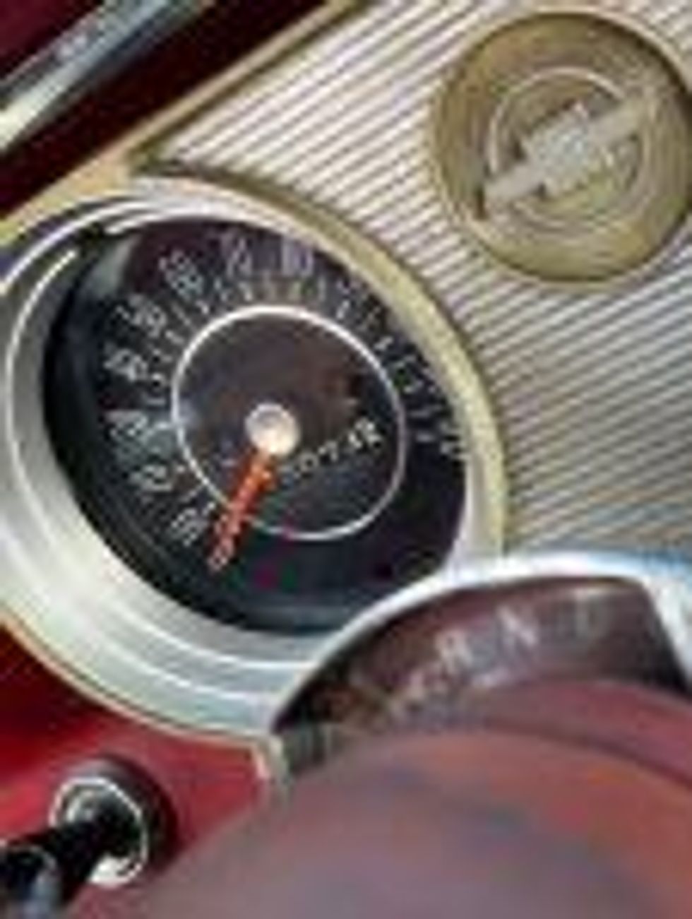 Close-up shot of the speedometer and shift quadrant of a 1962 Chevrolet Chevy II.