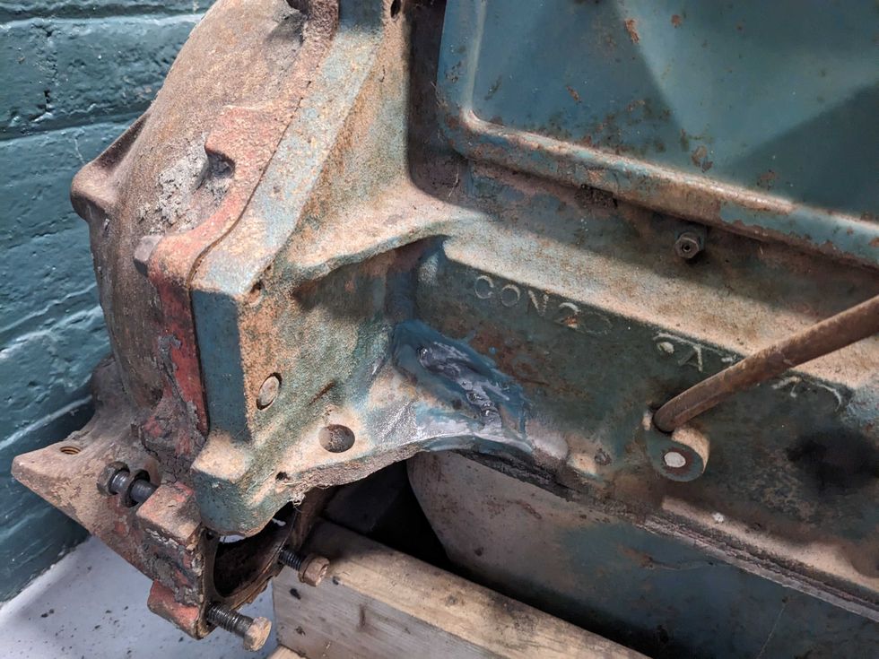 Closeup of cracks on the passenger's side of a 292-cu.in. Chevrolet High-Torque six-cylinder engine.