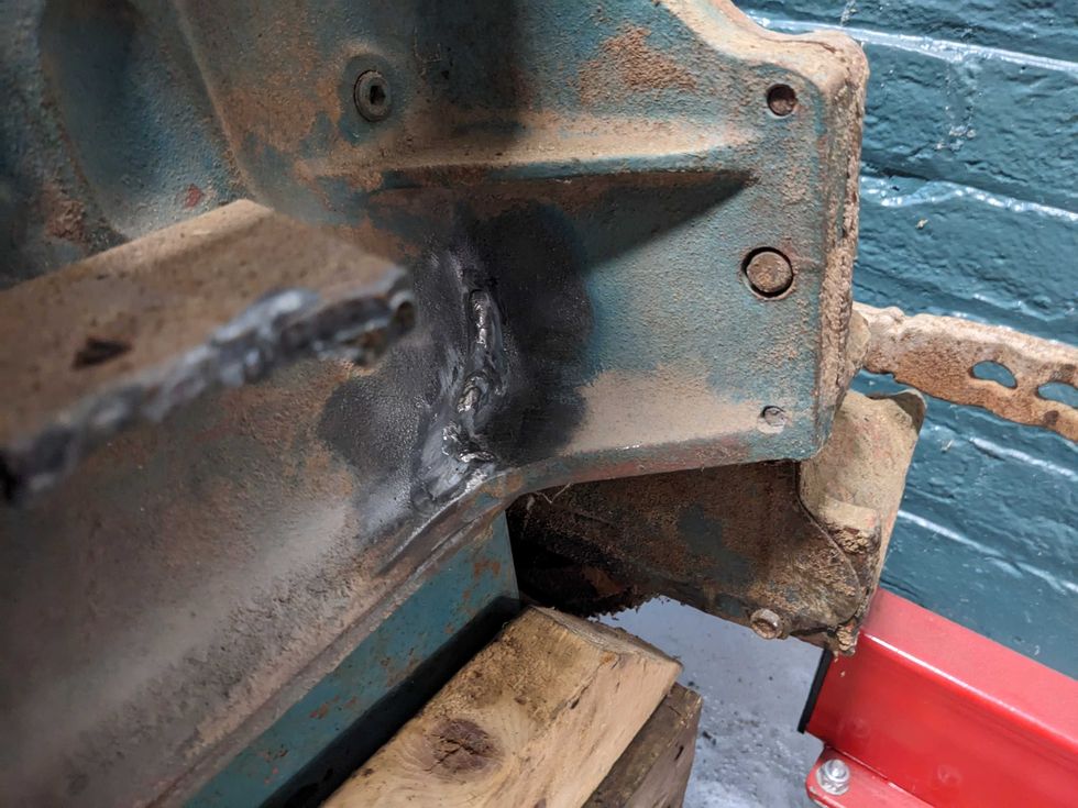Closeup of repaired cracks on the driver's side of a 292-cu.in. Chevrolet High-Torque six-cylinder.