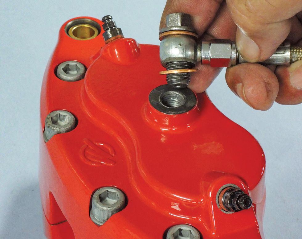 In two hours we had better brakes on our Chevelle with an aluminum caliper swap Hemmings