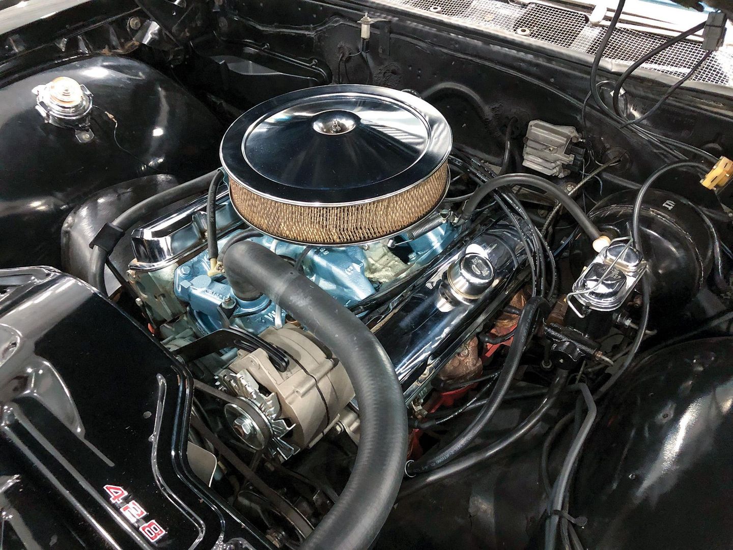 Color closeup of the 428 engine in a 1967 Pontiac Catalina 2+2.