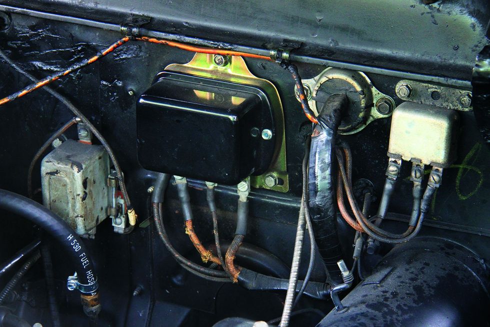 Color closeup of the engine bay in a 1950 Mercury Monterey Sport Coupe.