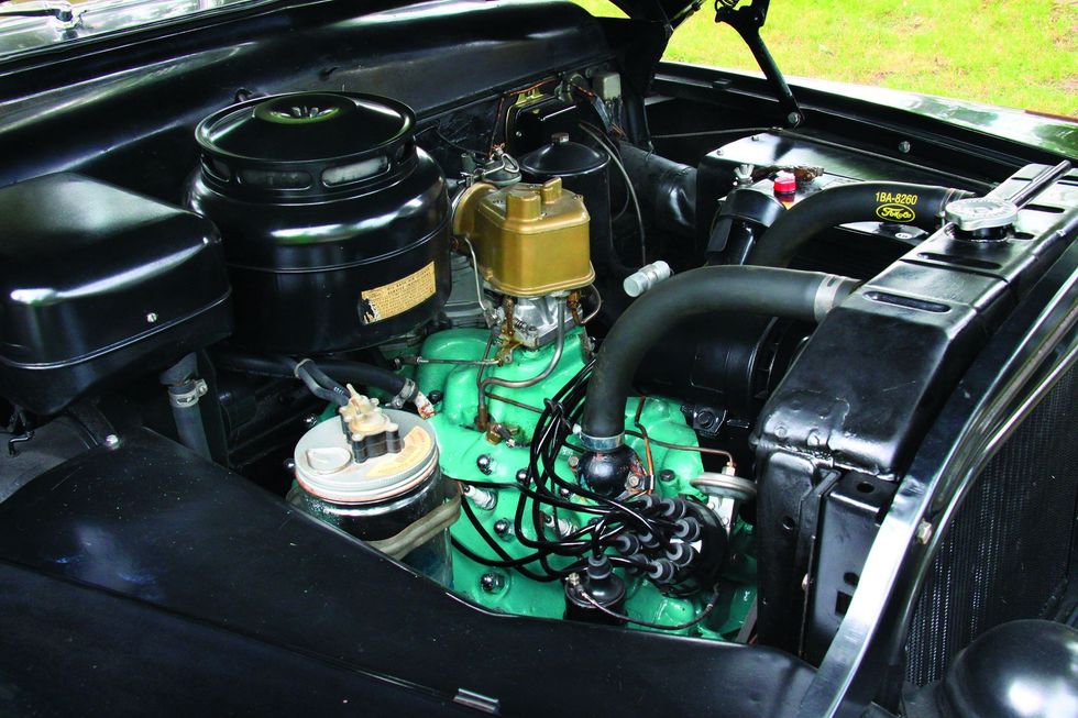 Color closeup of the engine bay in a 1950 Mercury Monterey Sport Coupe.