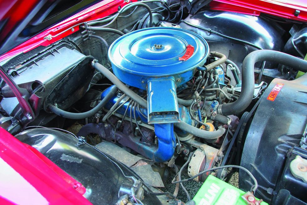 Color closeup of the engine bay in a 1969 Ford XL convertible.