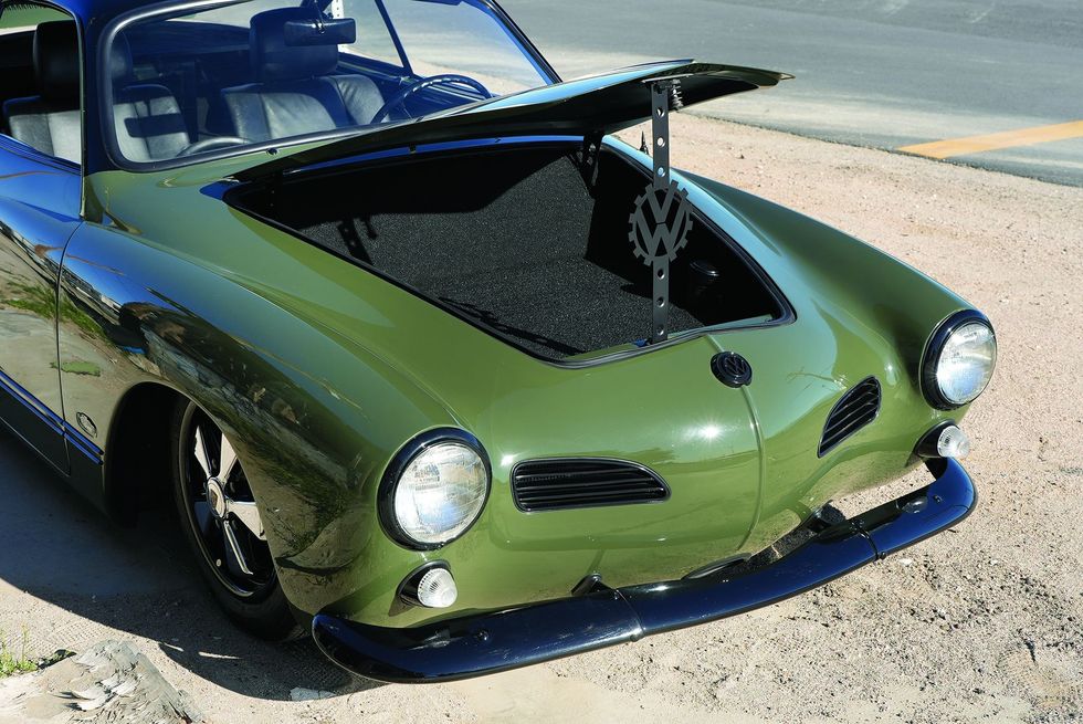 Color closeup of the grille and exposed trunk in a customized 1965 Volkswagen Karmann Ghia.