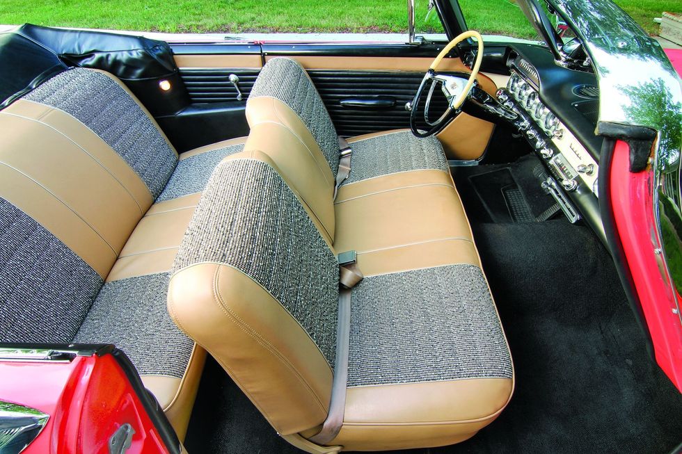 Color closeup of the interior and seats in a 1957 Dodge Custom Royal D-500.