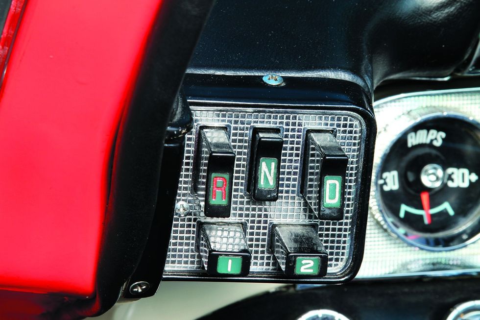 Color closeup of the pushbutton shifter in a 1957 Dodge Custom Royal D-500.