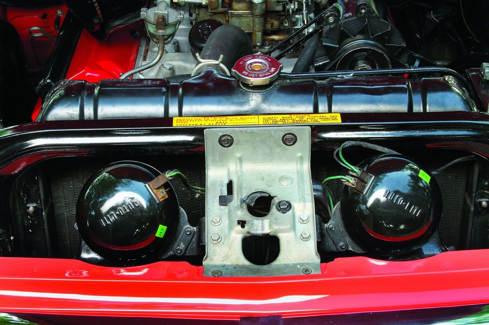 Color closeup of the radiator in a 1957 Dodge Custom Royal D-500.