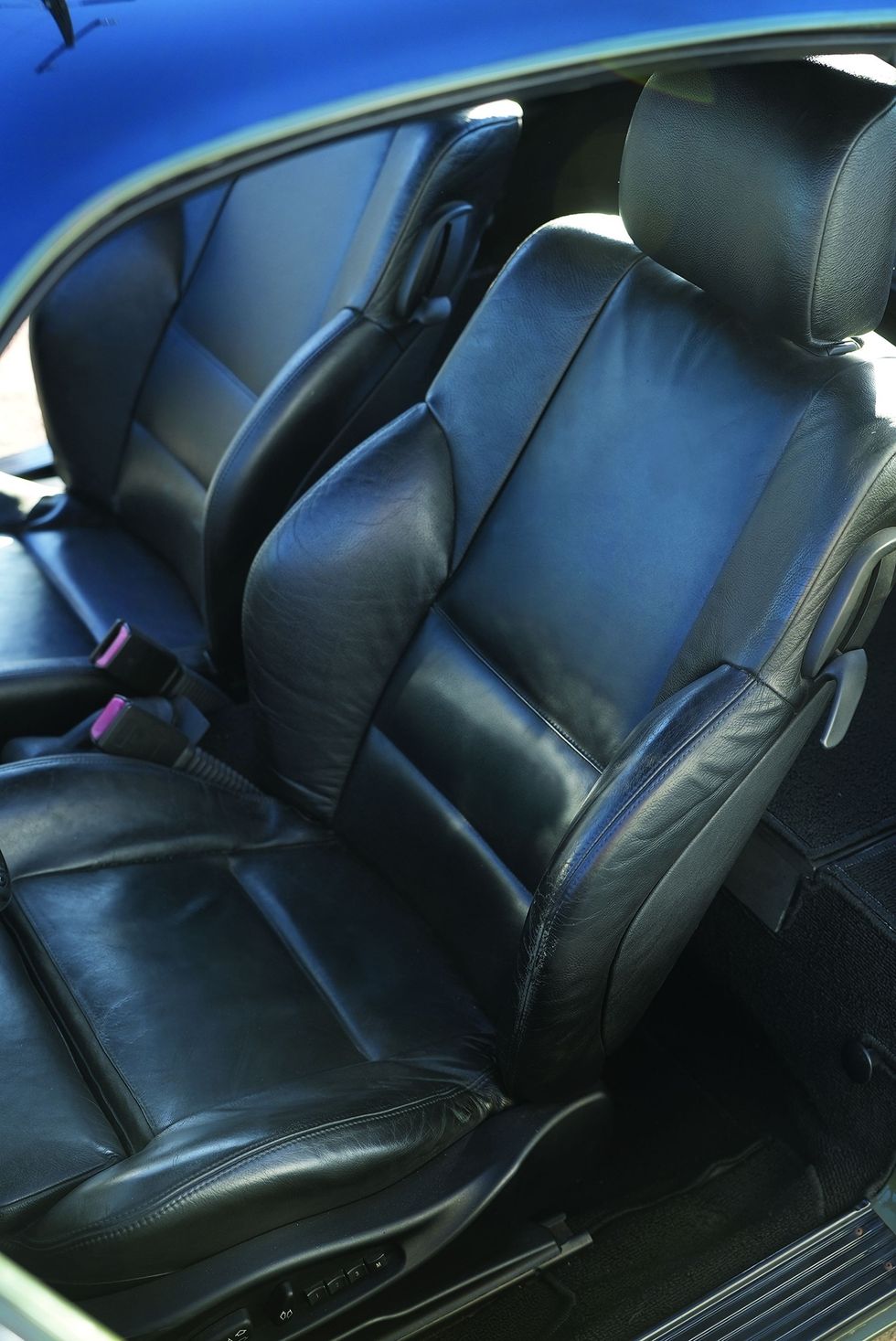 Color closeup of the seats in a customized 1965 Volkswagen Karmann Ghia.