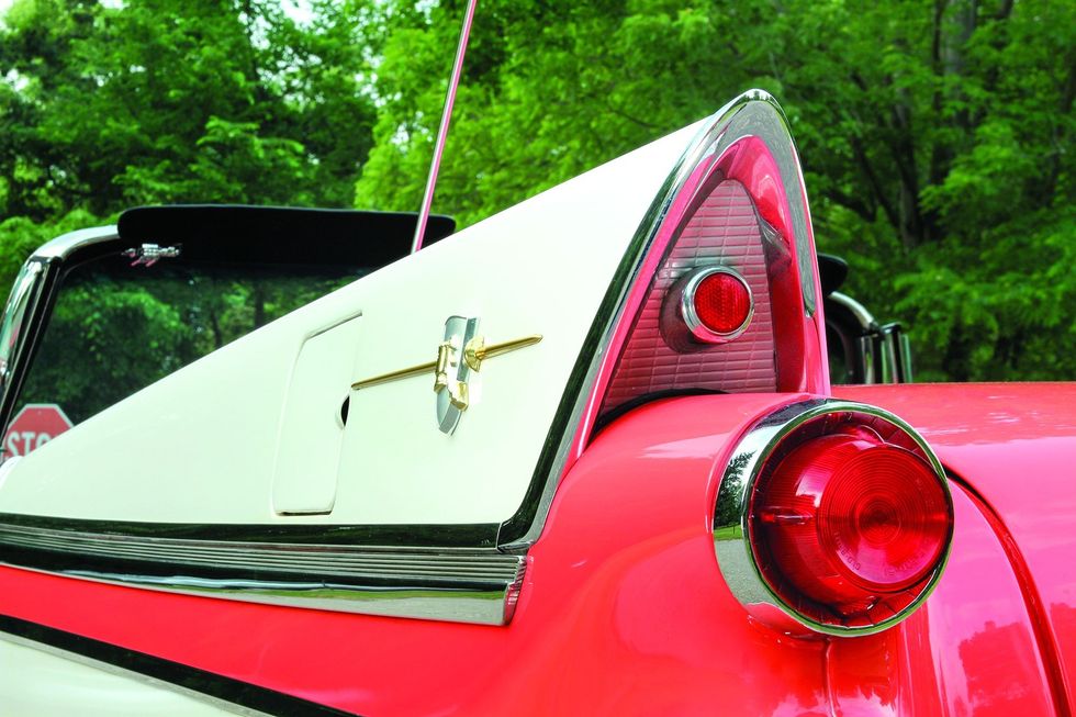 Color closeup of the tail fins and tail lamp on a 1957 Dodge Custom Royal D-500.