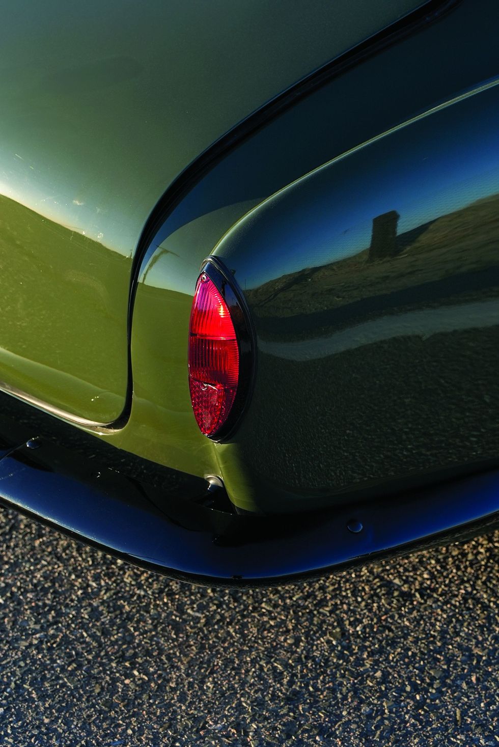 Color closeup of the tail lamp on a customized 1965 Volkswagen Karmann Ghia.