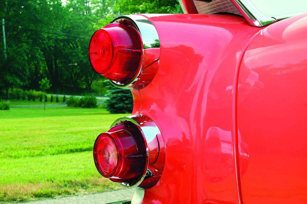 Color closeup of the tail lamps on a 1957 Dodge Custom Royal D-500.