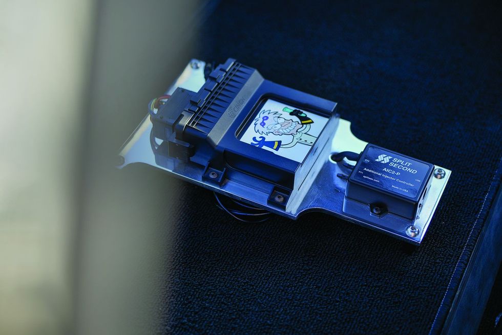 Color closeup of throttle switch in a customized 1965 Volkswagen Karmann Ghia.